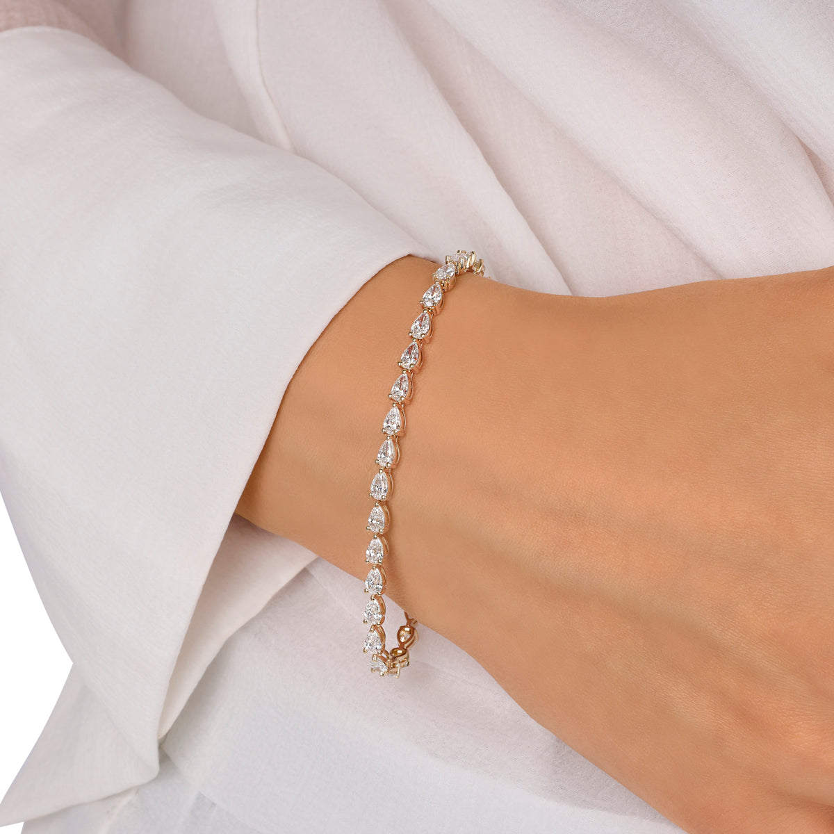 East/ West Pear Shape Tennis Bracelet