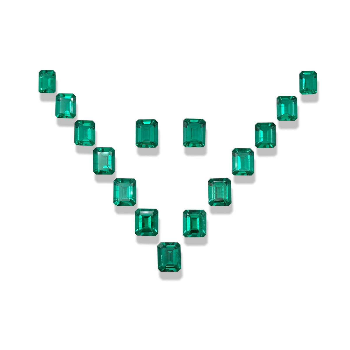 54.56cttw 15-pcs| Emerald Shape Step Cut Lab Emerald Suite-LITHOS Diamond